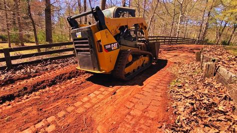 SkidSteer Cutting in Driveway with a Cutting